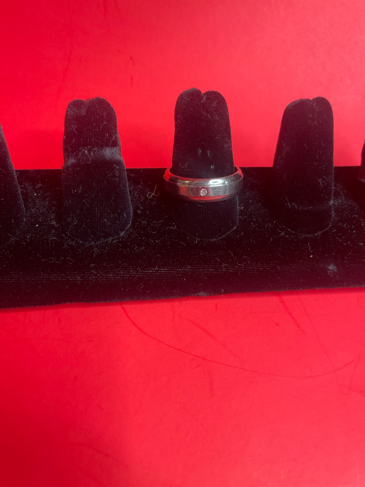 Titanium ring with 1 diamond (approximately .02) size 10, 4.2 gr