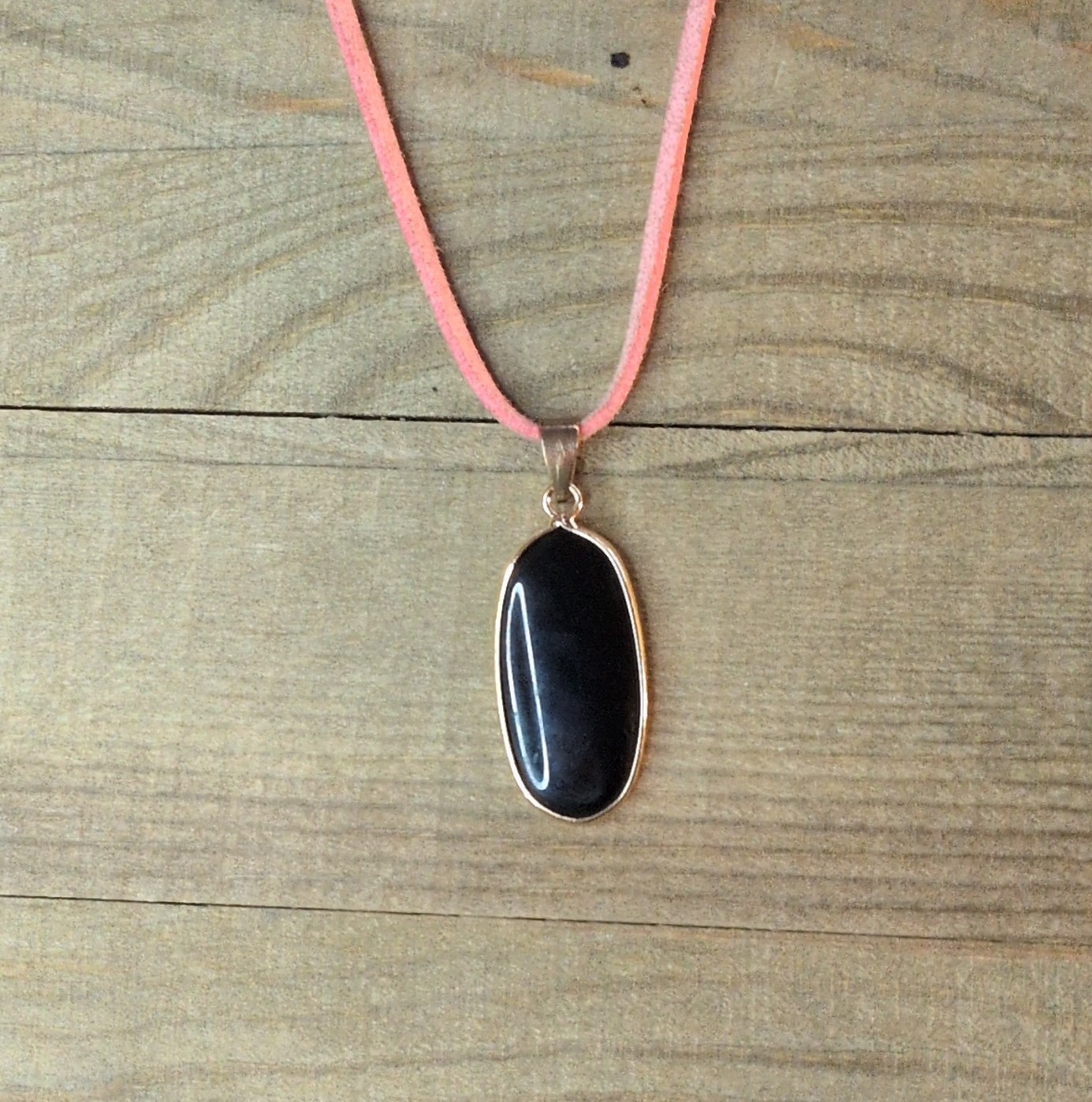Bezel-Set Oval Black Onyx Charm Pendant Necklace on Pink Cord, Silver Tone
