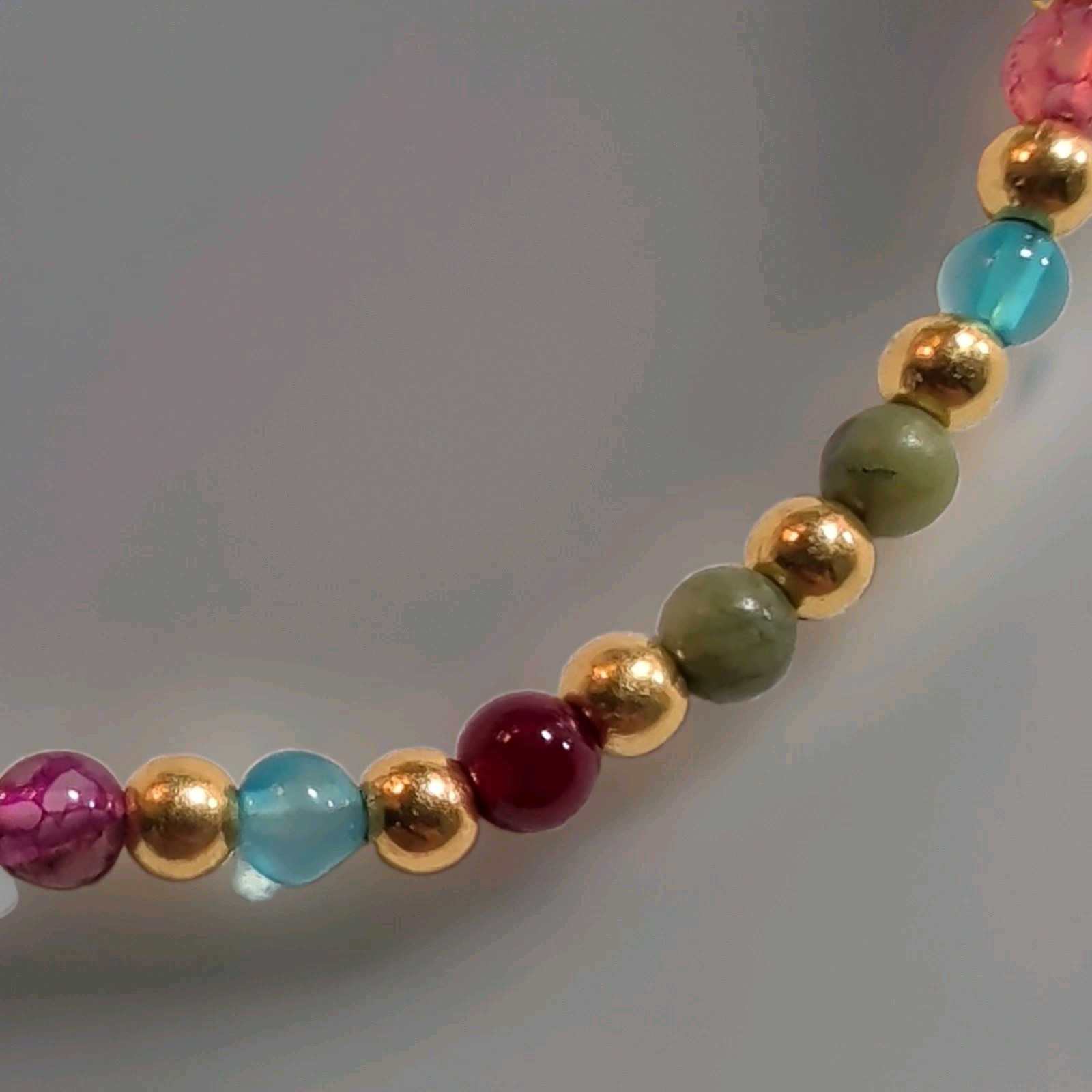 Multicolor Assorted Gemstone Round Bead Bracelet 7.5 in Gold-Tone Lobster
