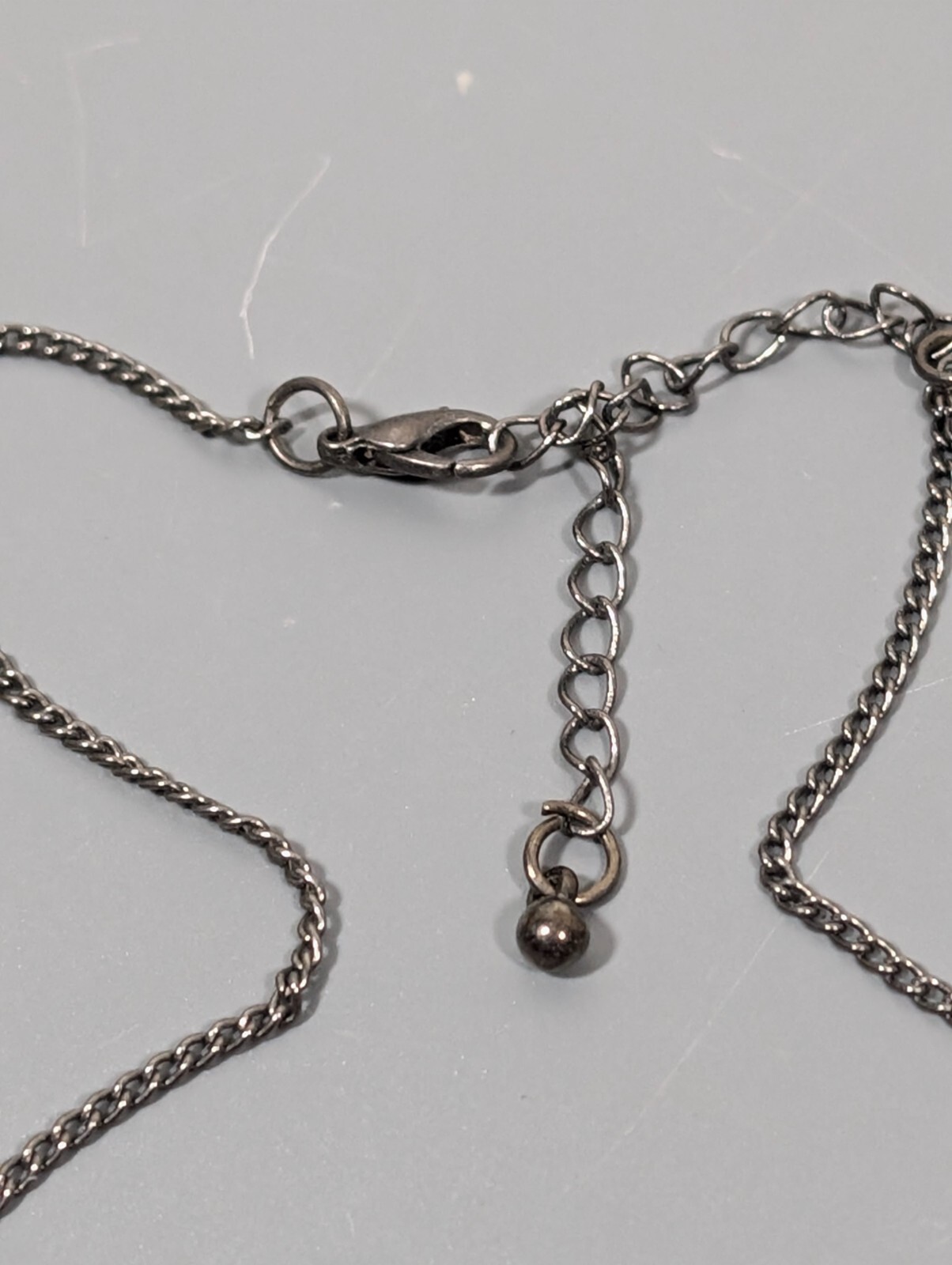 Gray Metallic Blue Rhinestone Sideways Cross Bead Necklace Gothic 23 in