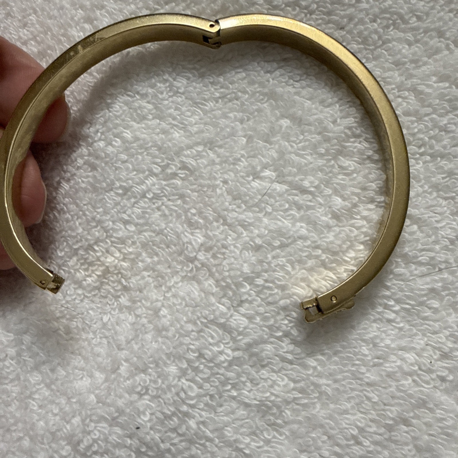 Fossil Brand Gold tone latch closure bangle with white stones