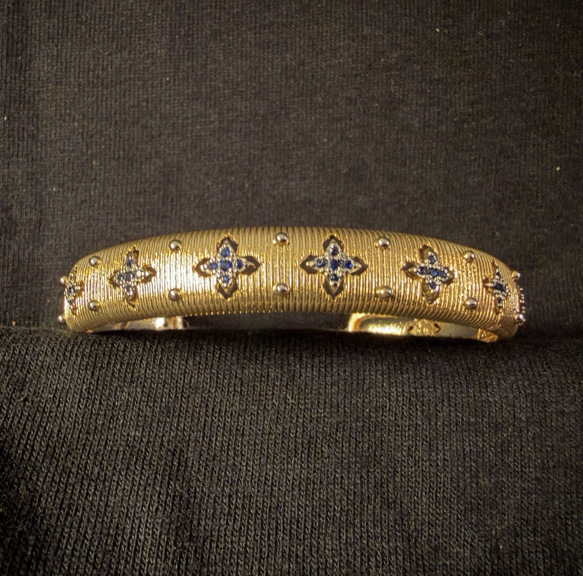 Gold Tone Metal Open Cuff Bangle Bracelet w/ Blue Stone Clover Accents