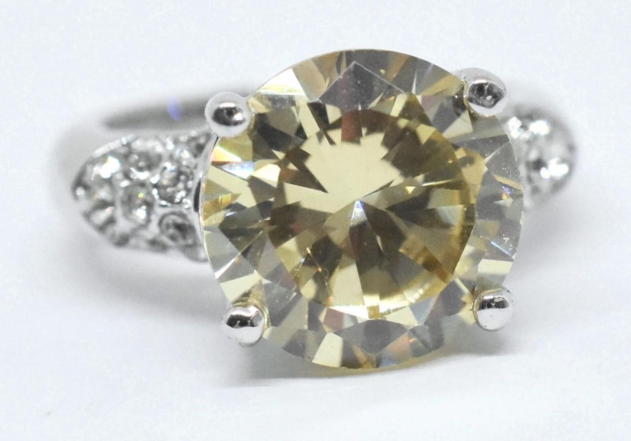 Ladies Designer Signed NWOT Yellow & Clear Crystal Stainless Steel Cocktail Ring