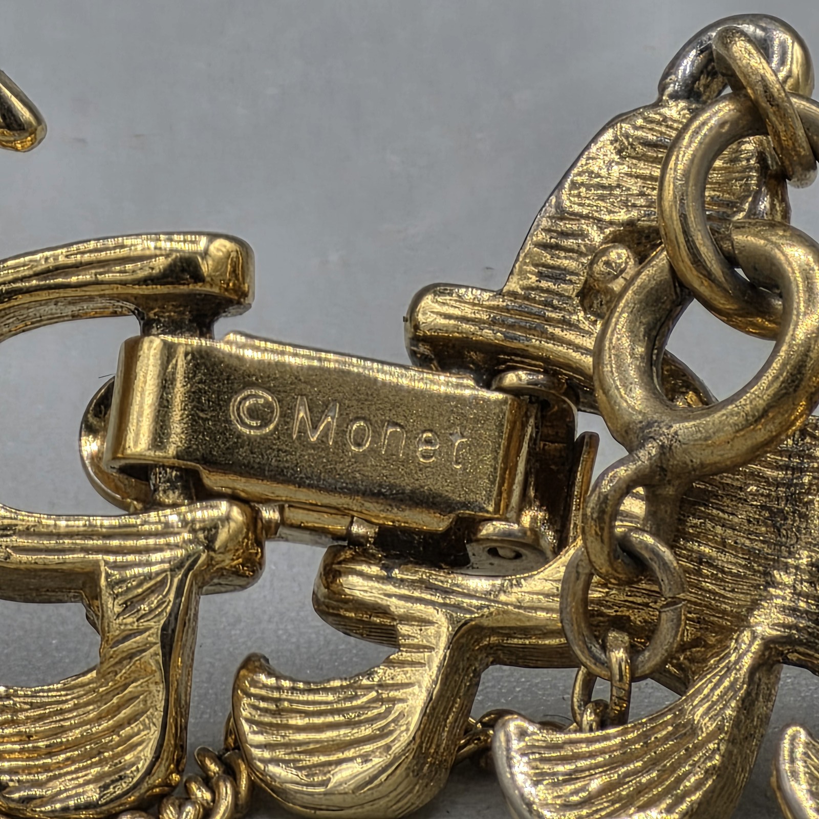 Vintage Monet Gold Tone Textured Link Panel Bracelet Fold Over Clasp