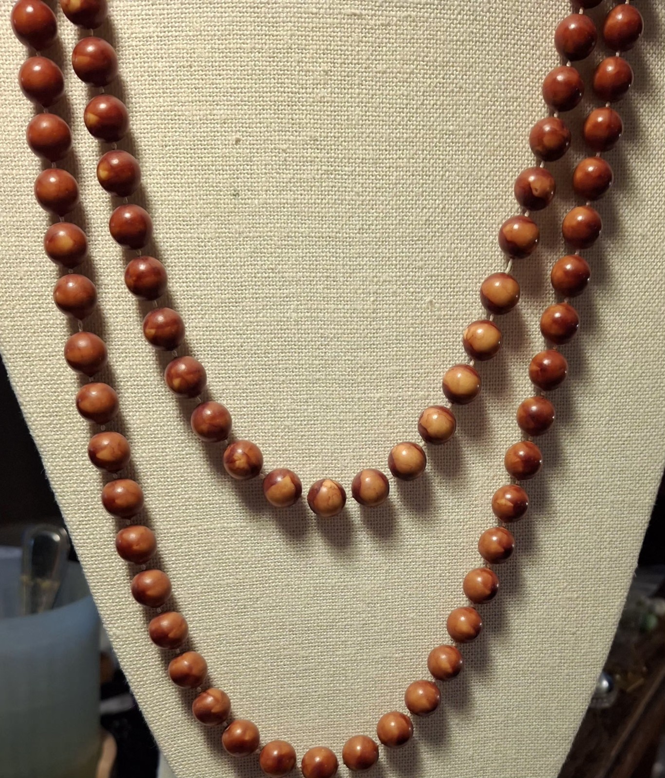 Pre-owned no brand 2 necklaces..reddish brown, orange faux wood beads