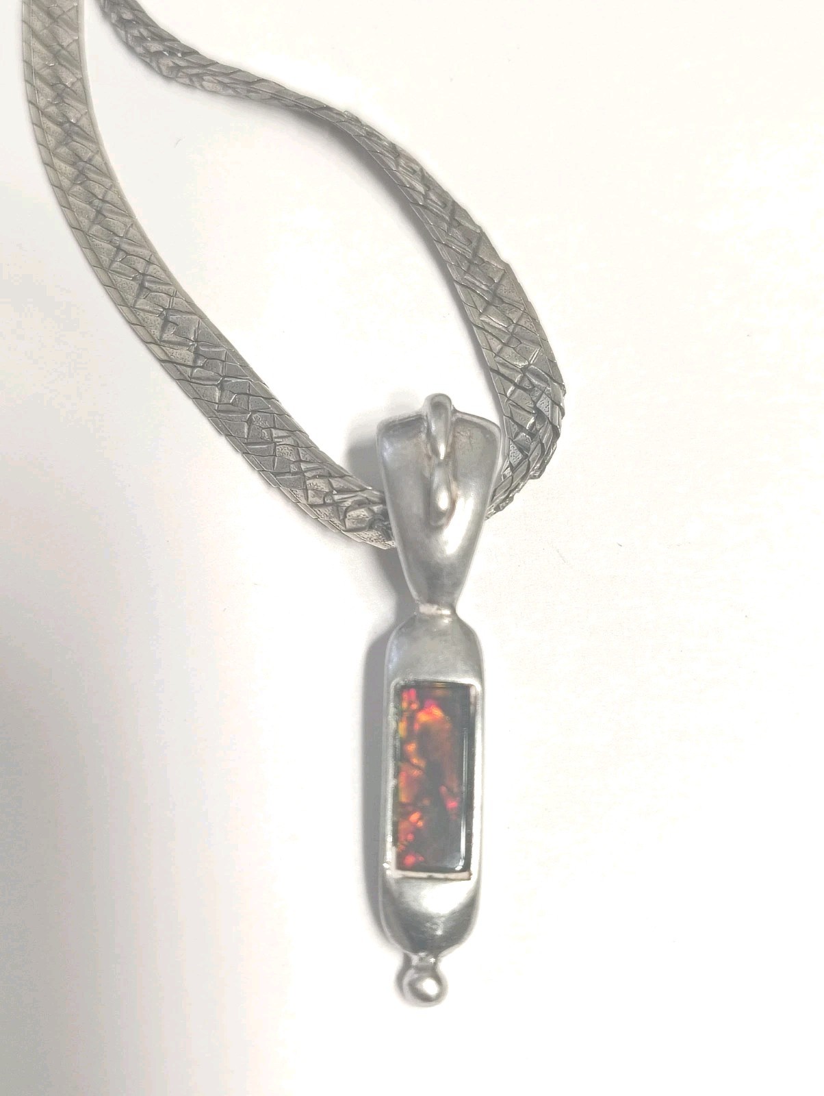 Korite Ammolite In Silver On 5 mm 16″ Sterling Silver Herringbone Chain