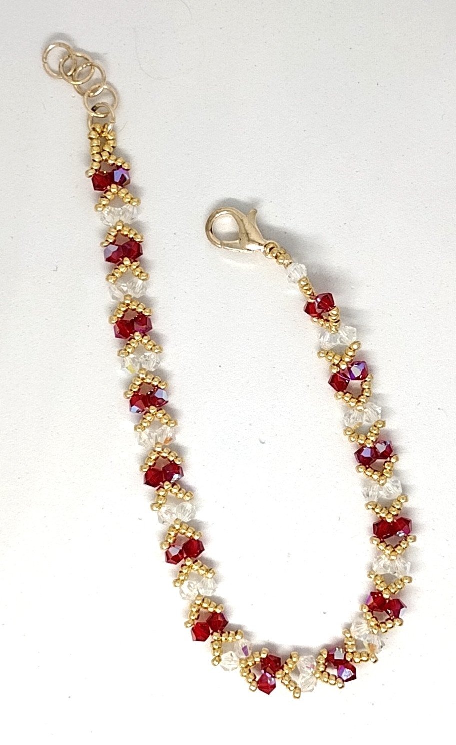 6-inch Bracelet 4mm Crystal Red/White Sparkly Bicone Beads/Gold Miyuki Beads.