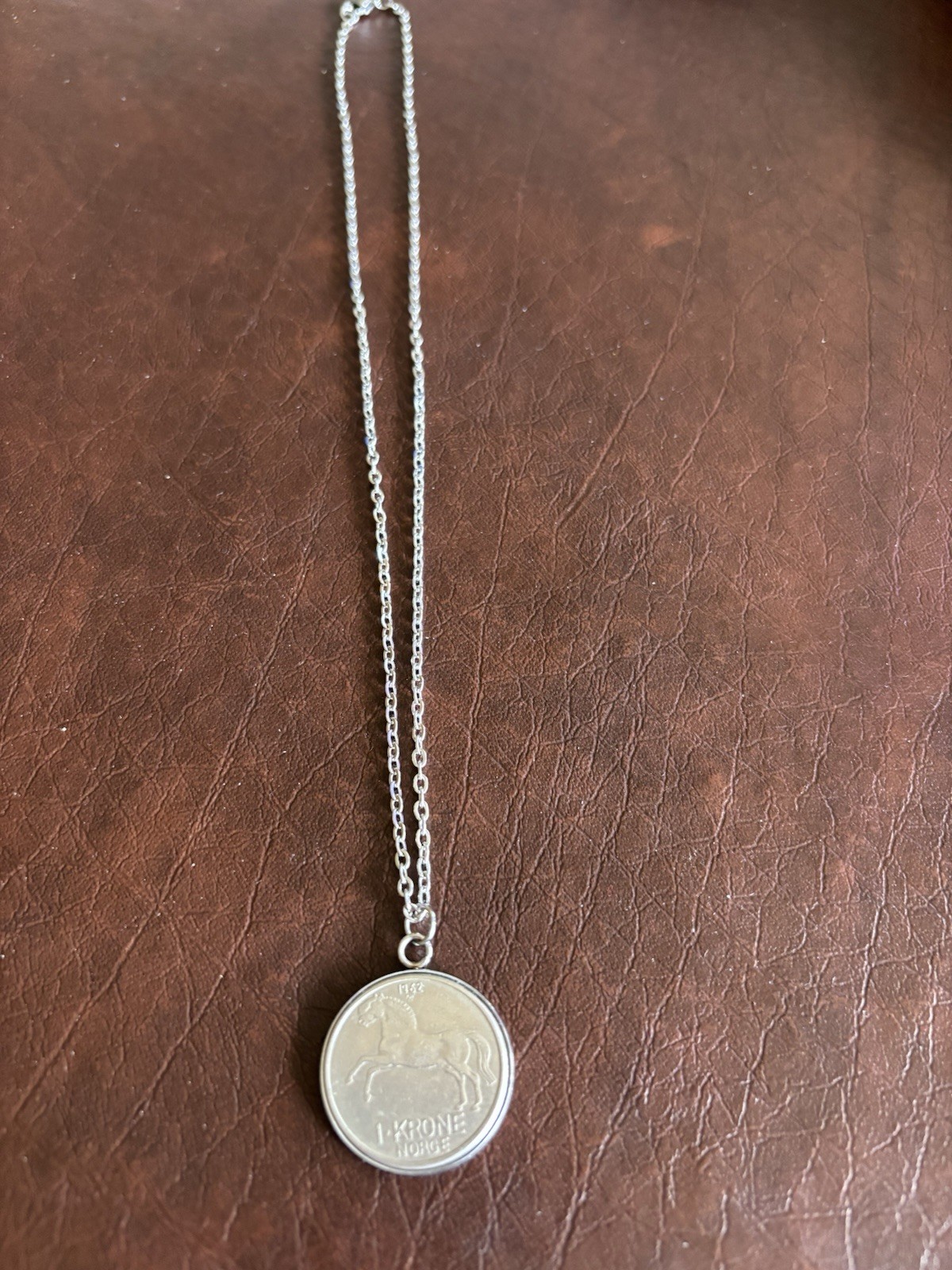 Love Horses? One Krone Norwegian Coin Necklace.