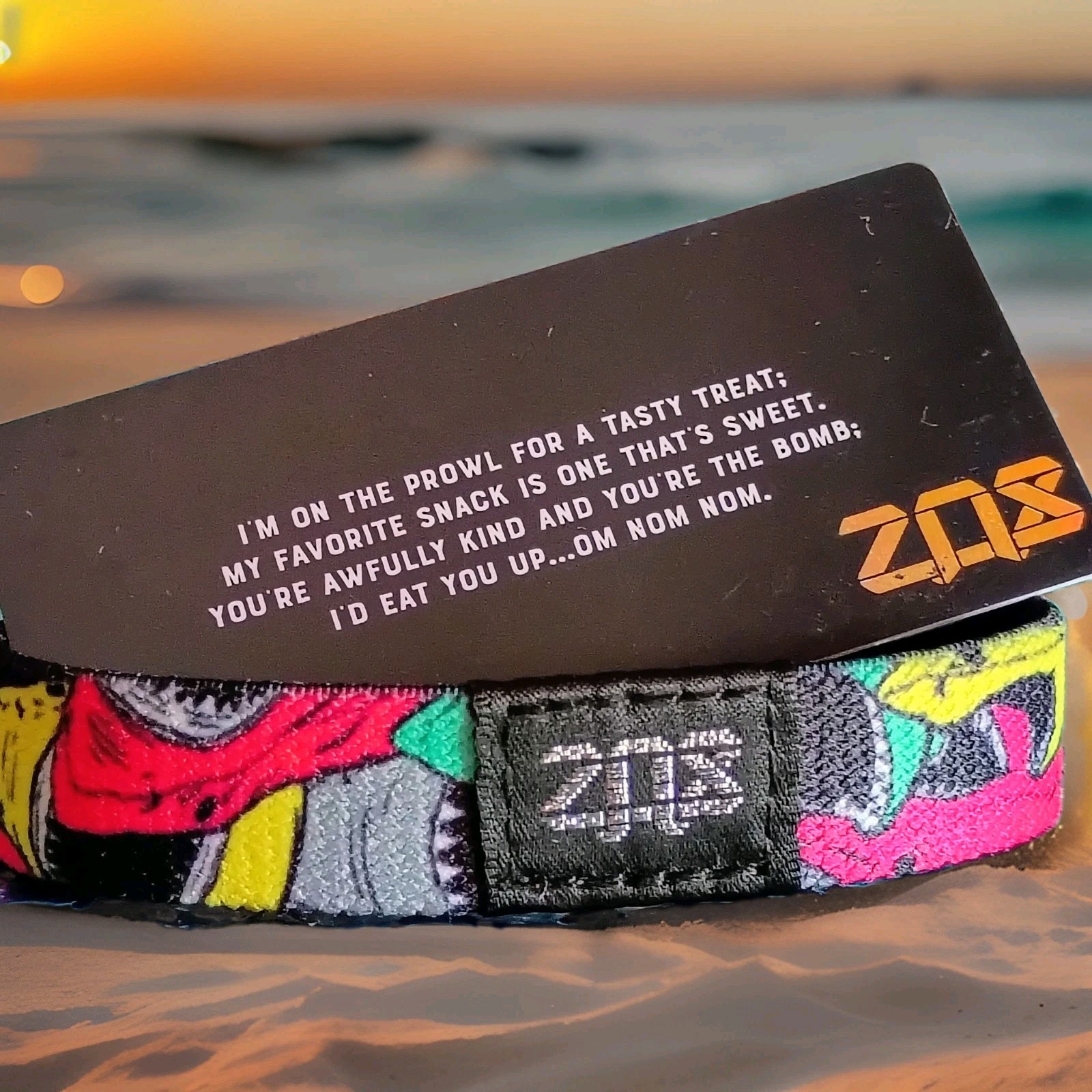 ZOX “I COULD JUST EAT YOU UP” Strap W/ Card. (Size Medium) -Silver