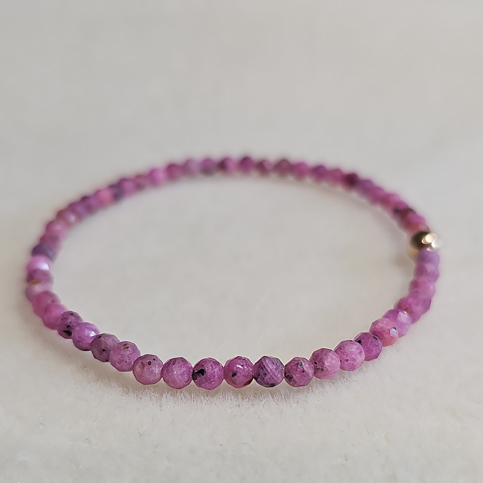 Faceted Ruby Beads Bracelet Round Beads with 10kt Gold Spacer Bead Stretchy