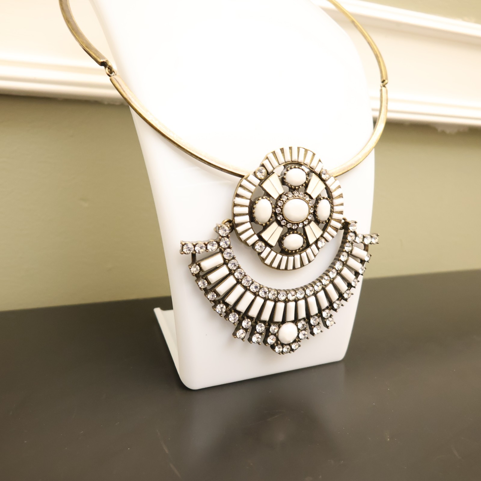 Logo Links necklace Lori Goldstein ivory crystals statement collar bronzetone