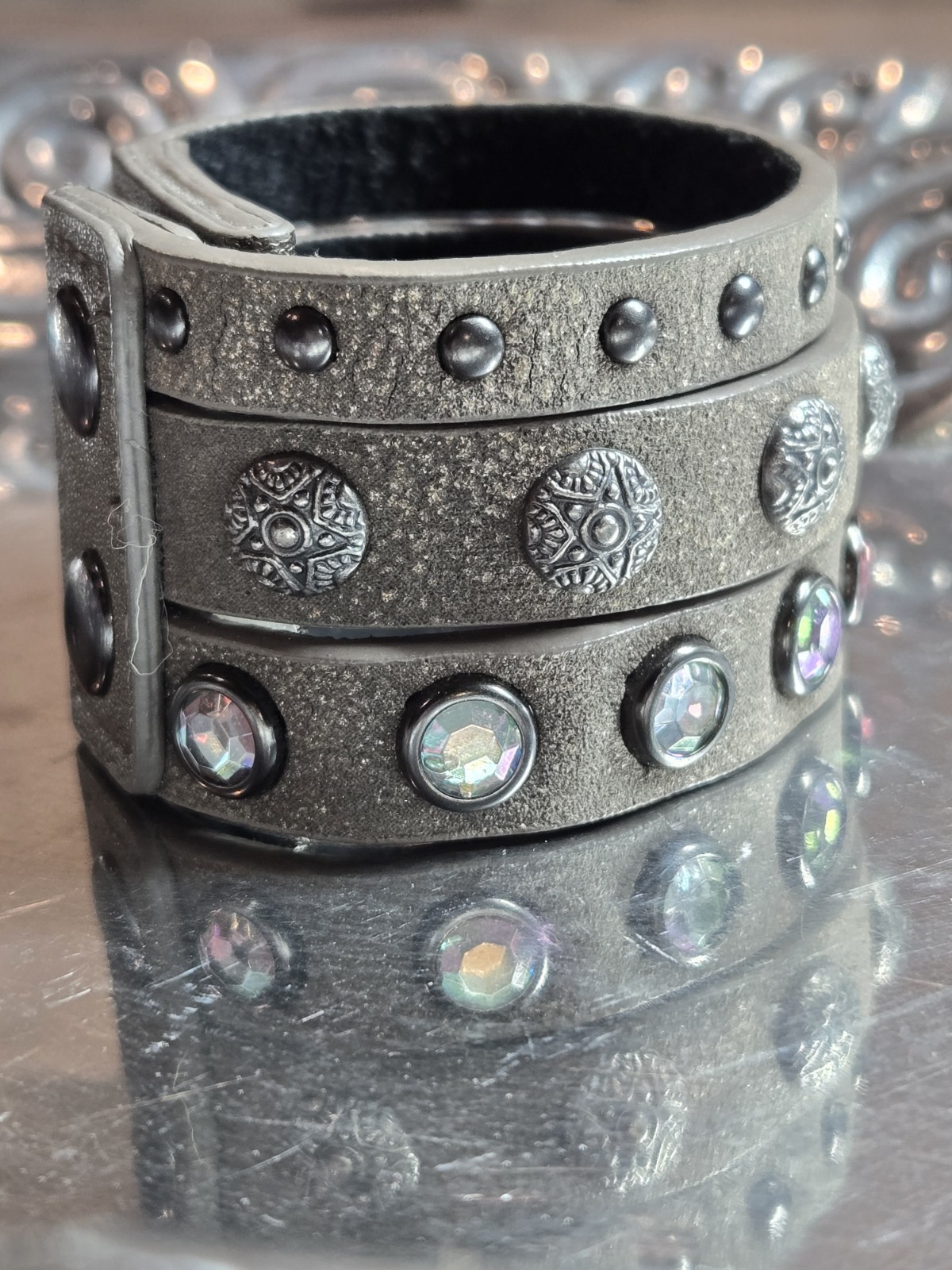 Rhinestone Studded Metal Leather Triple Band Cuff. Snap closure with 2 fittings