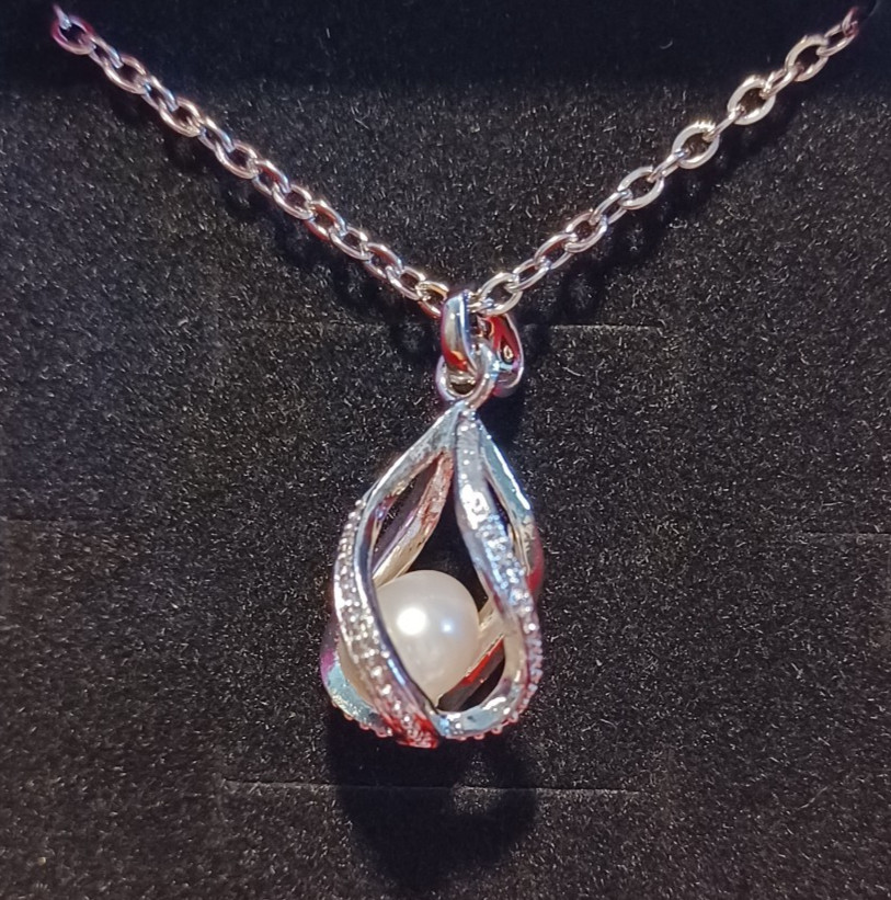 Stylish Caged Freshwater Pearl Fashion Pendant Necklace. Casual and Formal Wear