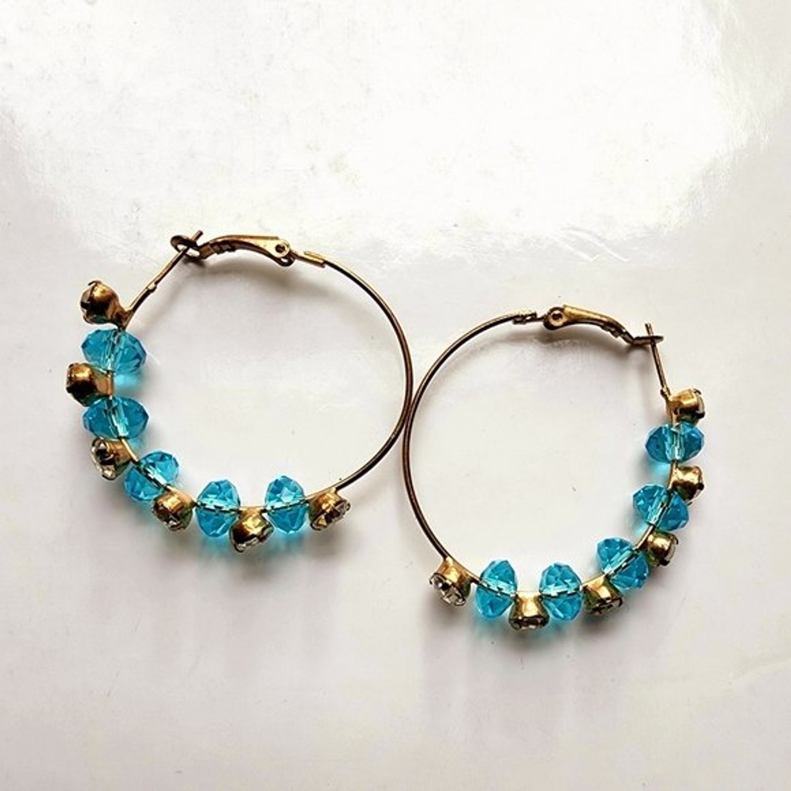 Large Bohemian wire rhinestone station hoops with brilliant blue stones