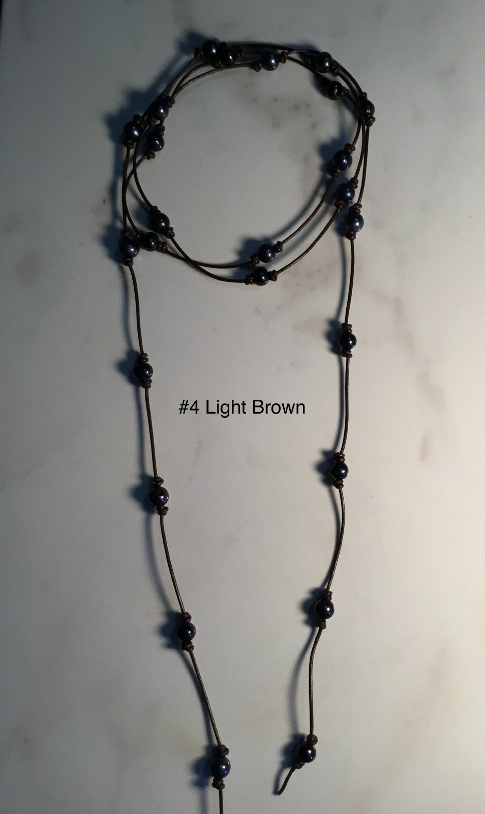 60″ Leather Black Pearl Necklace and 16″-19″ Adjustable Infinity Pearl Necklace