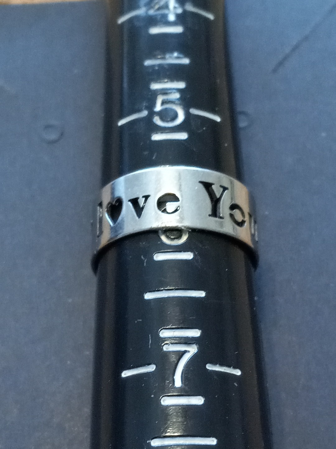 Stainless Steel Fashion Ring – Stamped Love You. 7mm Wide. Size 5.5 (B20)