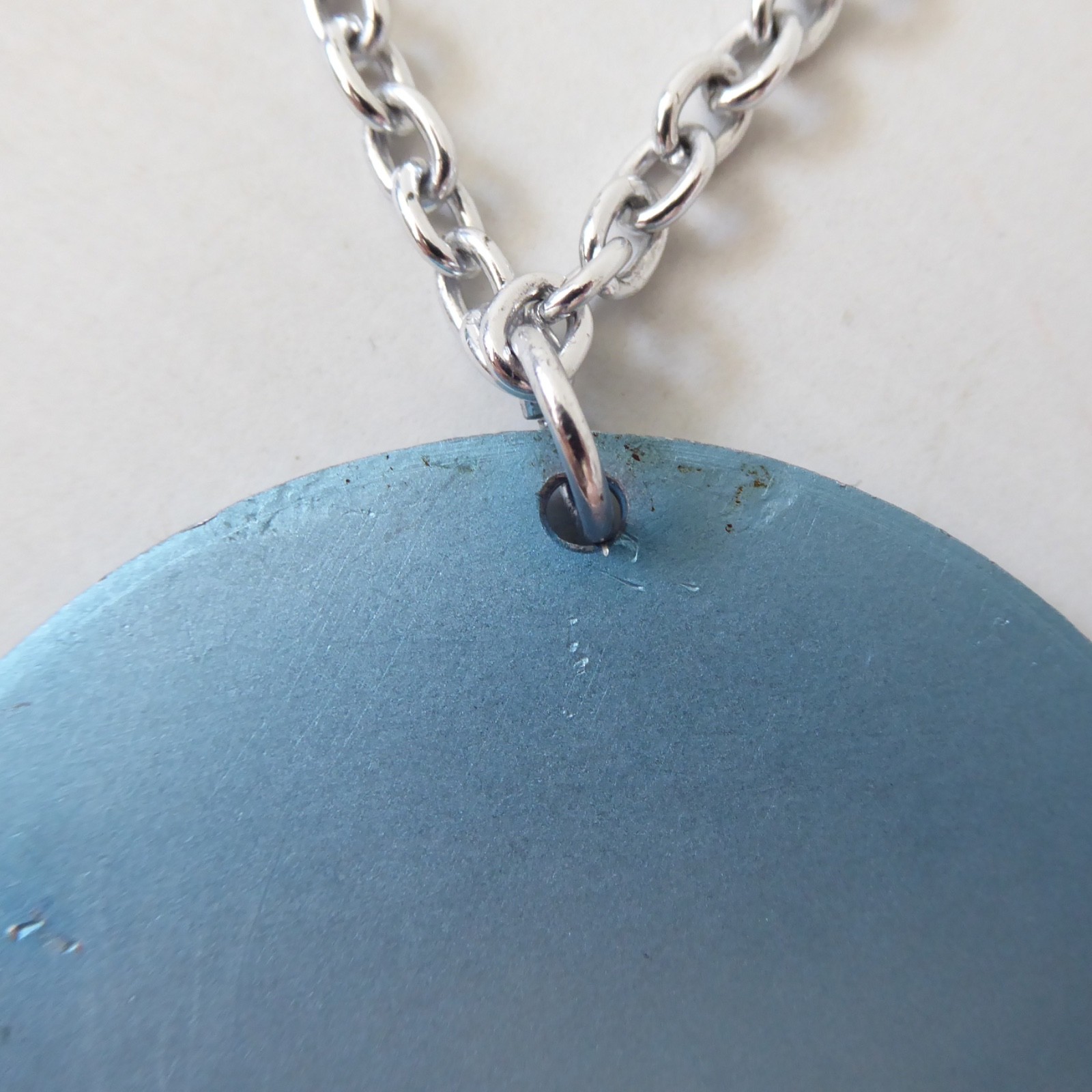 Conrah cristillium pendant necklace. Aluminium anodised blue metal. Geometric