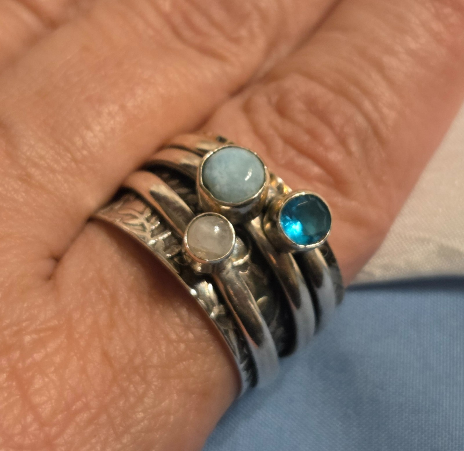 Fun Sterling Silver Spinner Ring with Larimar, Blue Topaz, and White Moonstone