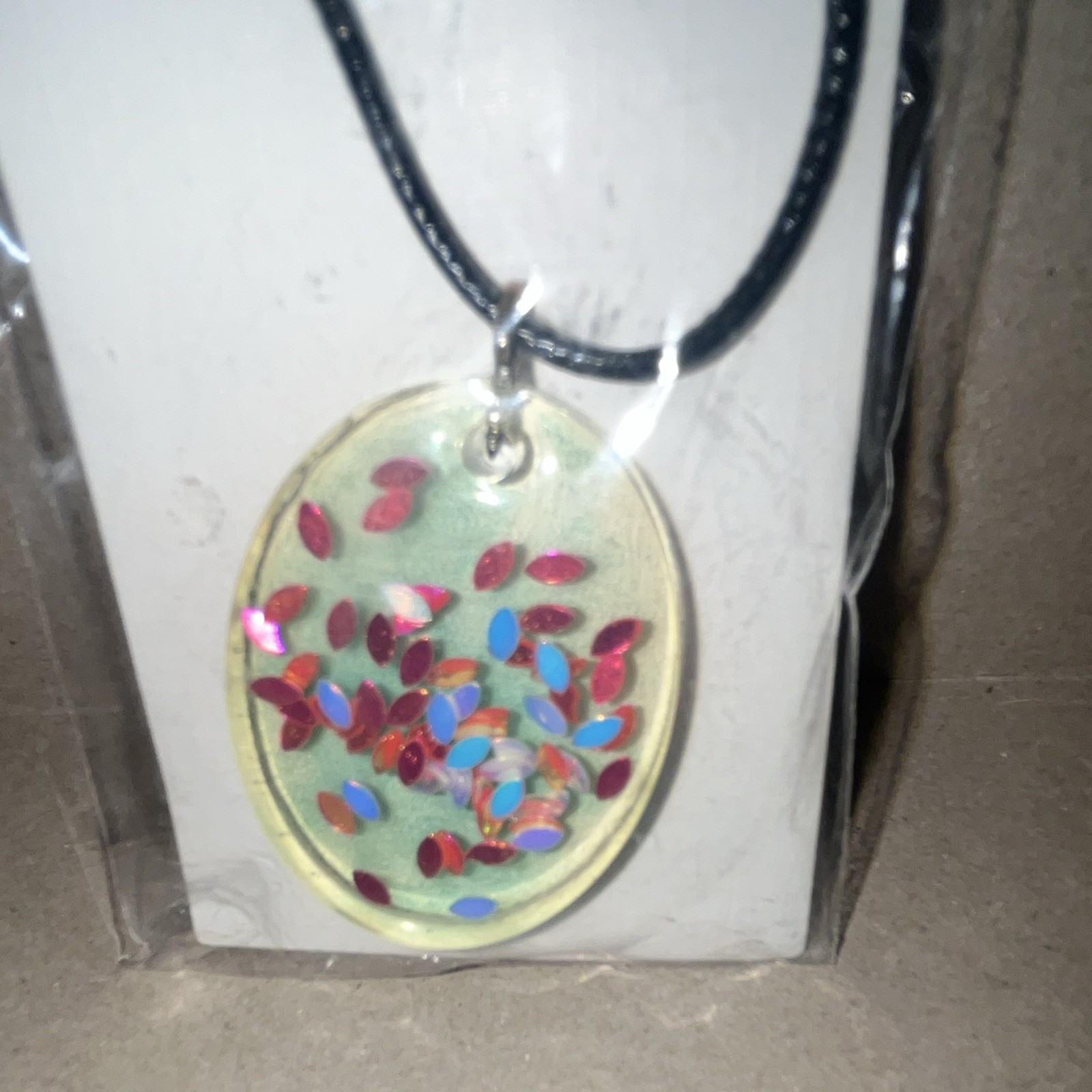 Multicolor Confetti Oval Charm Pendant Necklace on Black Cord, Plastic