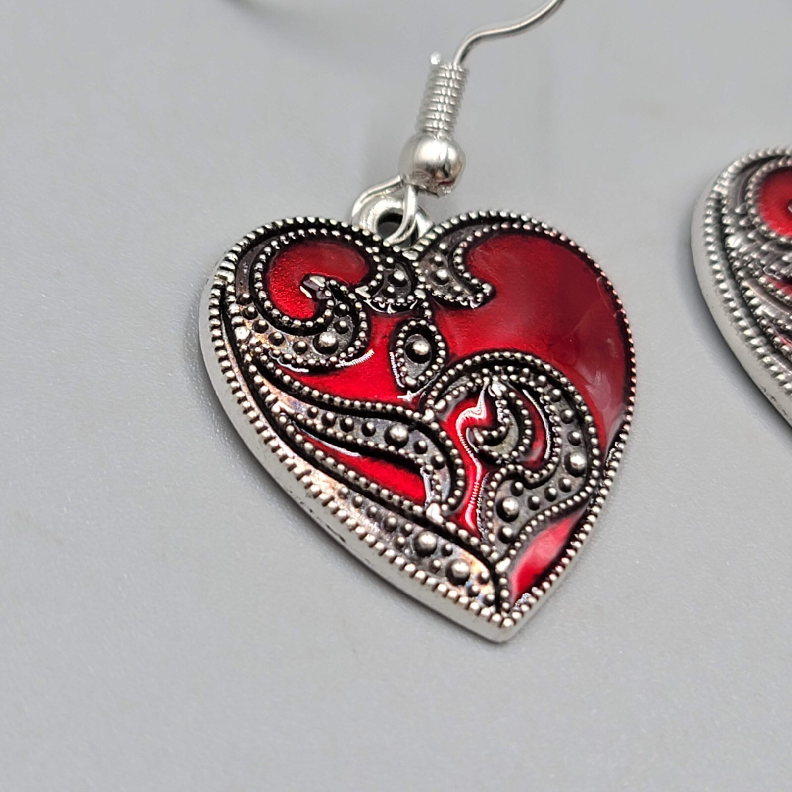 Satin Enamel Heart Pierced Earrings Black Swirl Accent Silver tone Dangle 1″