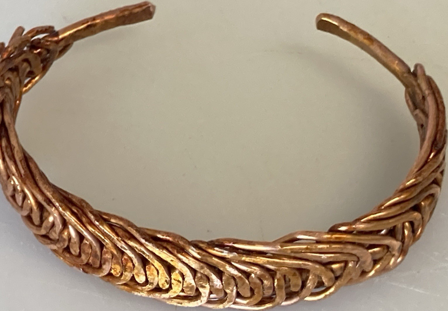 Braided copper cuff bracelet size 7 with a handmade, textured finish.