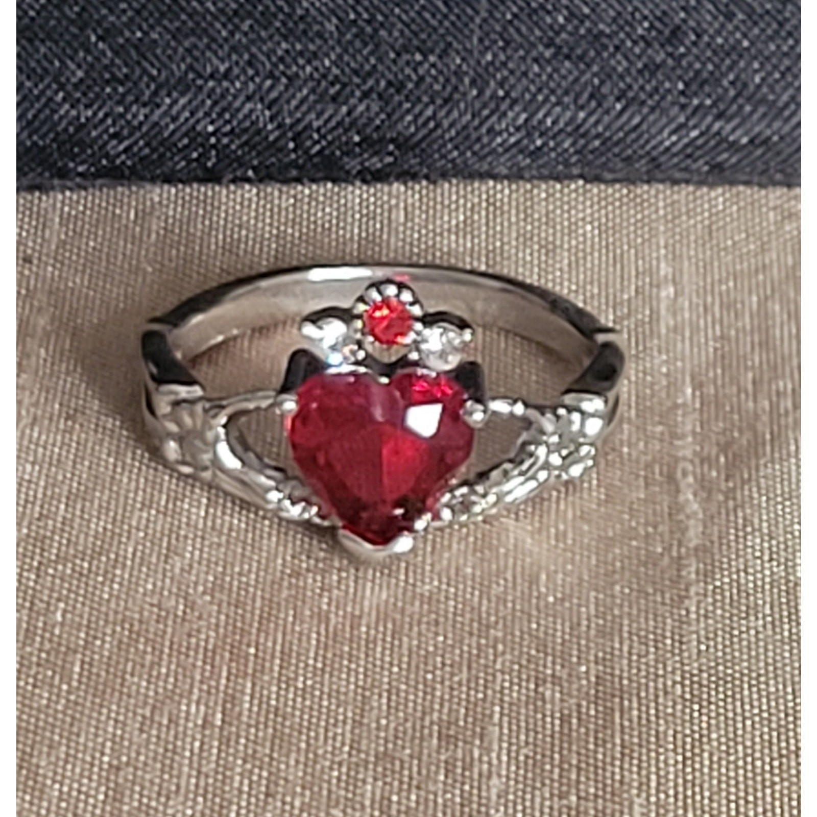 Size 7 gothic claddagh ring, skeleton hands holding red crystal heart