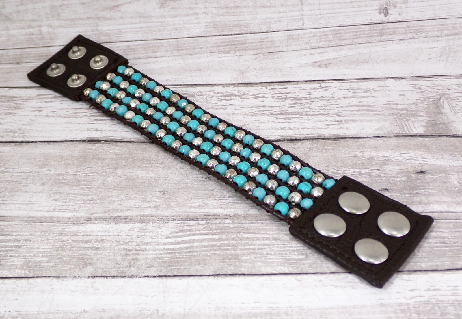 Wide turquoise and silver beaded leather bracelet , snap closure, brown leather