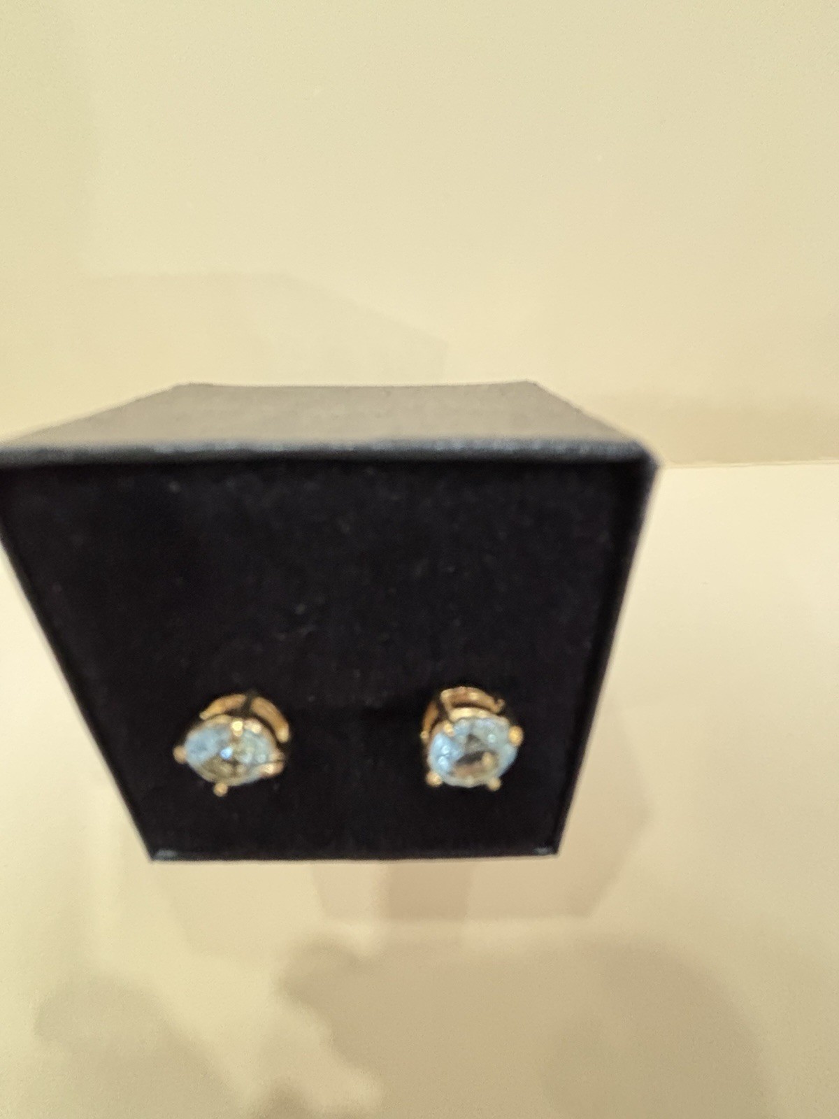 Beautiful Woman’s 18k yellow gold over Sterling Silver Blue Topaz round studs