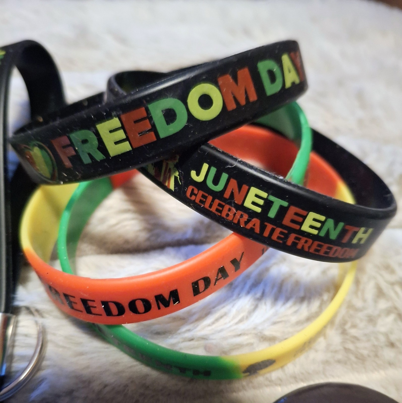 Juneteenth Celebration – Pins, Bracelet and Key Rings. 12 Items.