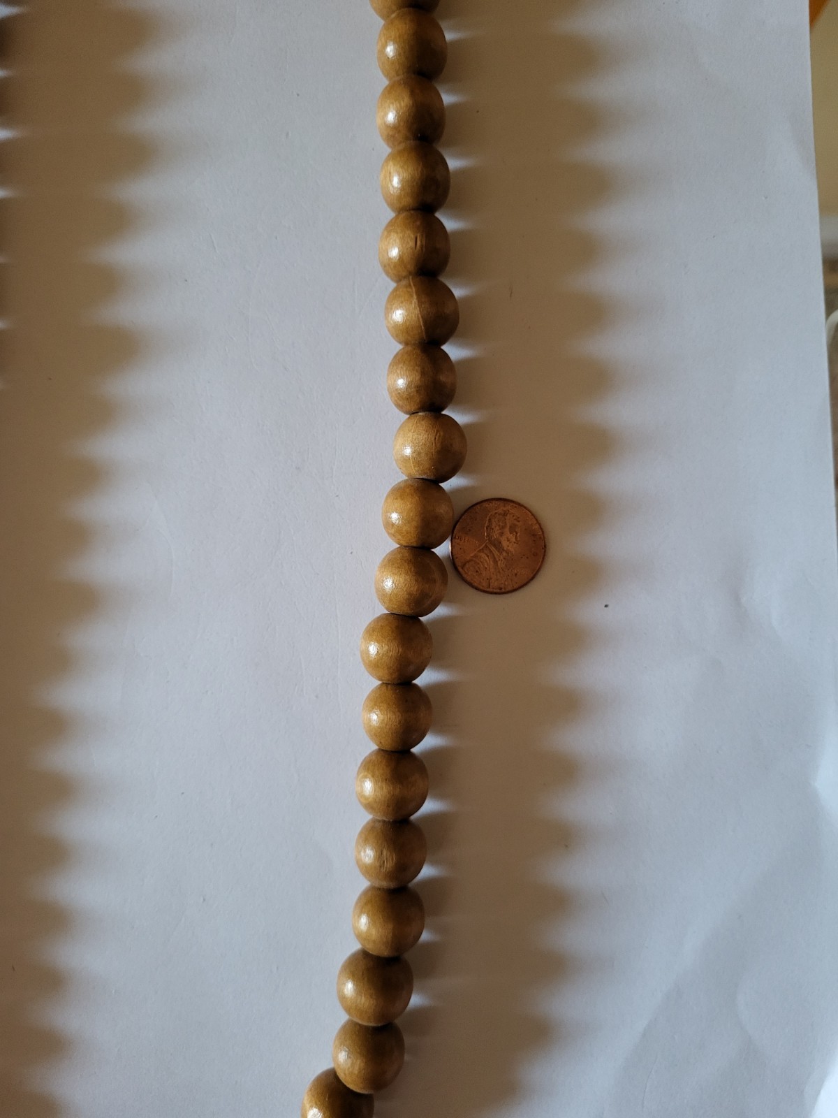 Long wooden bead necklace made of light brown beads 37in