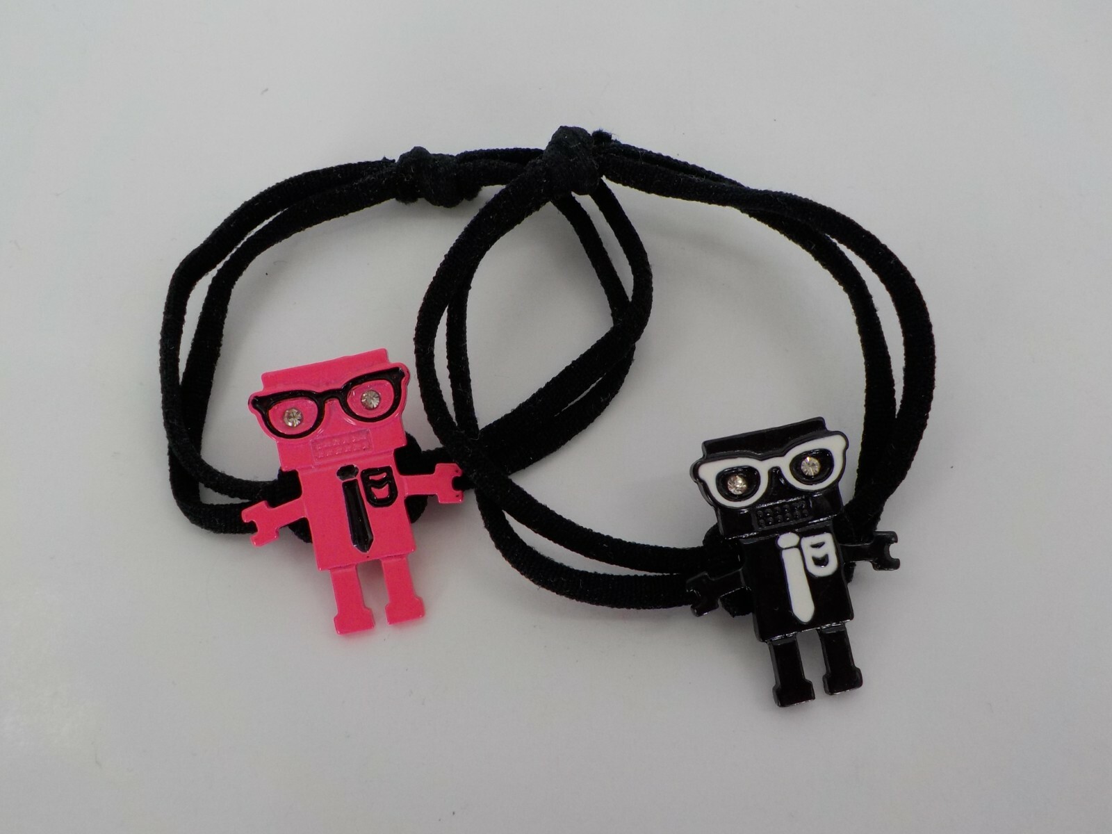 2 ELASTIC YOUTH BRACELETS PINK & BLACK NERD ROBOTS W/ GLASSES POCKET PROTECTORS