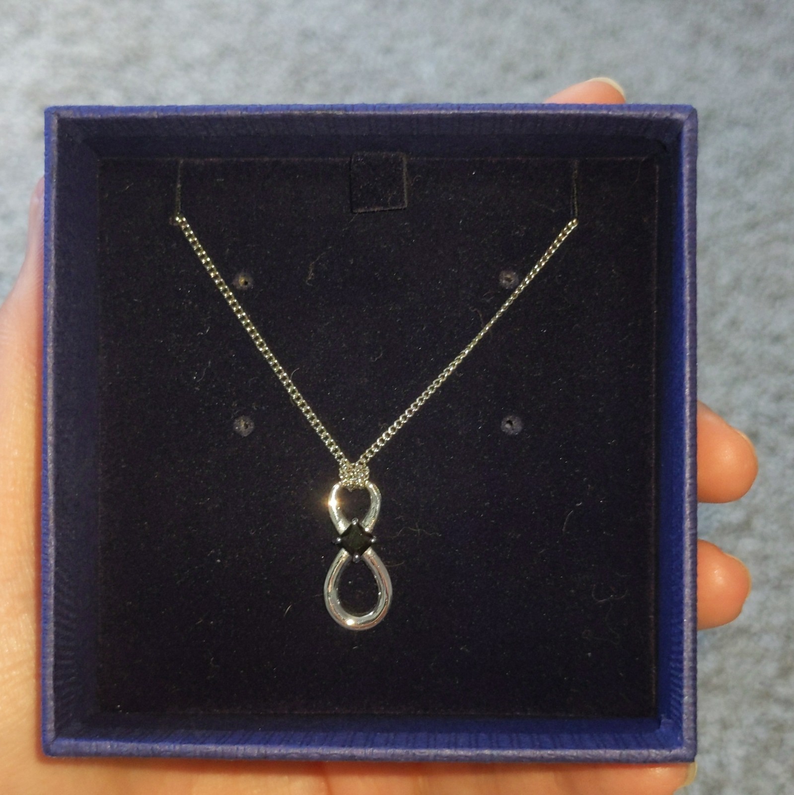 NEVER WORN silver Swarovski Infinity Necklace, in original box with tags, unworn