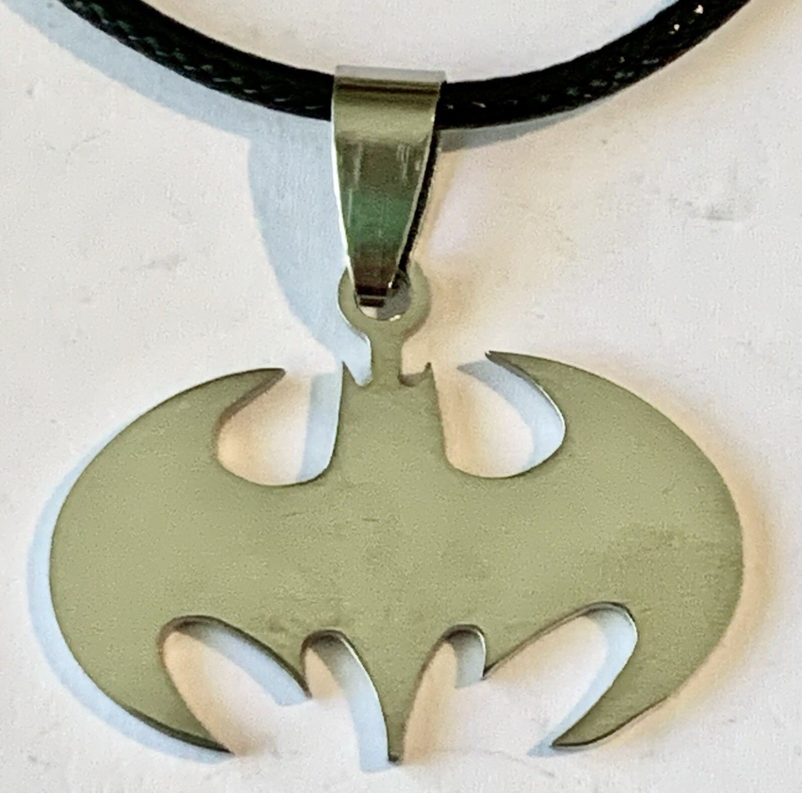 AWESOME DC BATMAN NECKLACE!! BLACK CORD!! GREAT GIFT IDEA