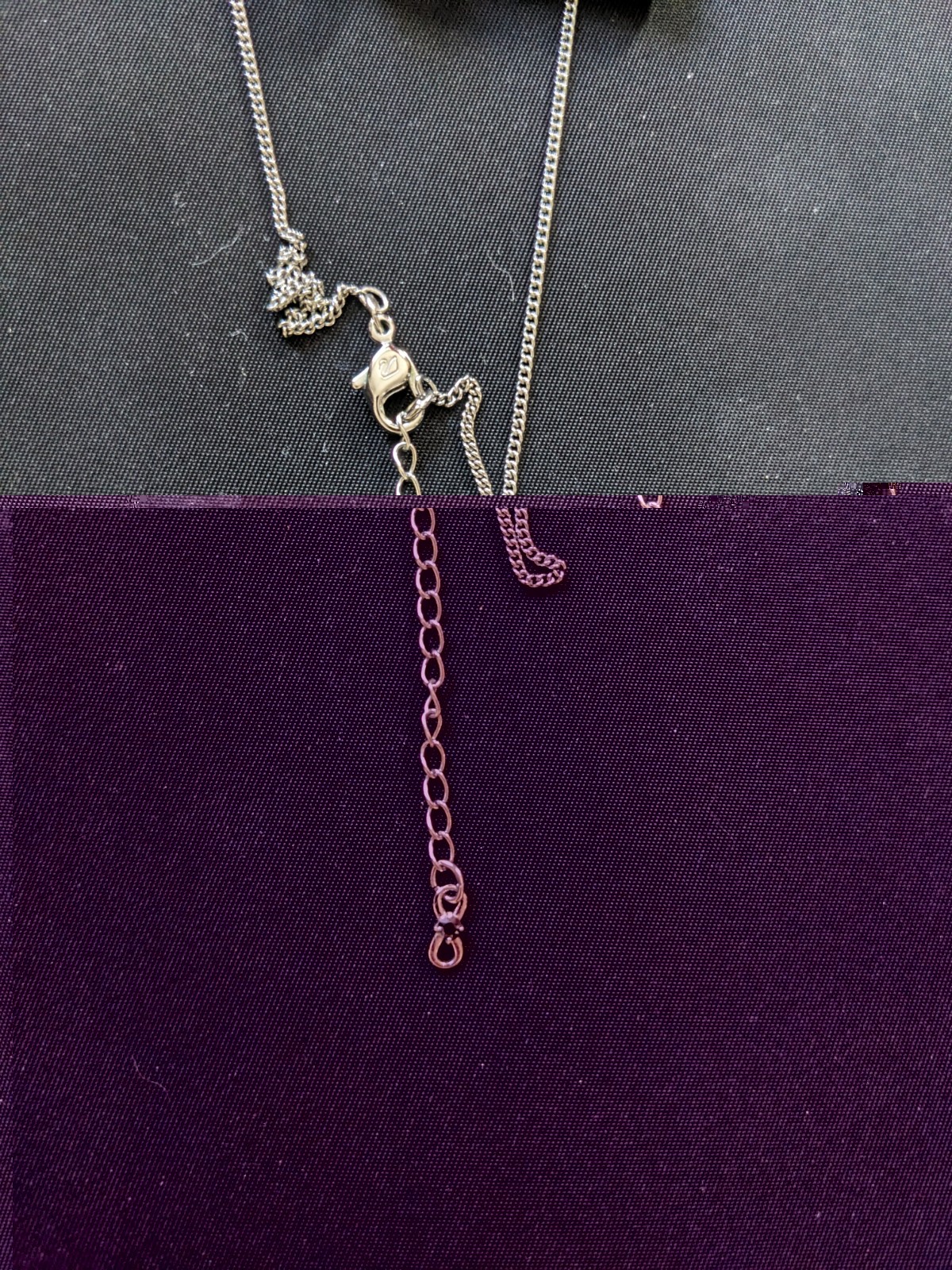 NEVER WORN silver Swarovski Infinity Necklace, in original box with tags, unworn
