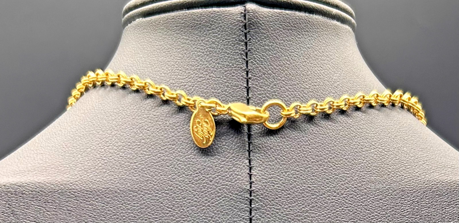 Vintage 1990s Kirks Folly Gold Tone Aurora Borealis Blue Crystal Heart Pendant