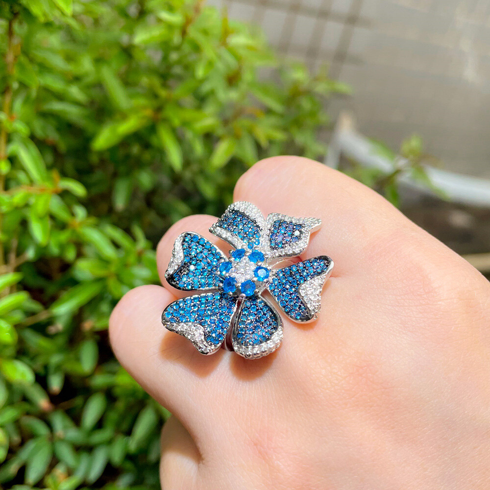Adjustable 3D Geometric Flower Pave Setting Blue Cubic Zirconia Engagement Ring