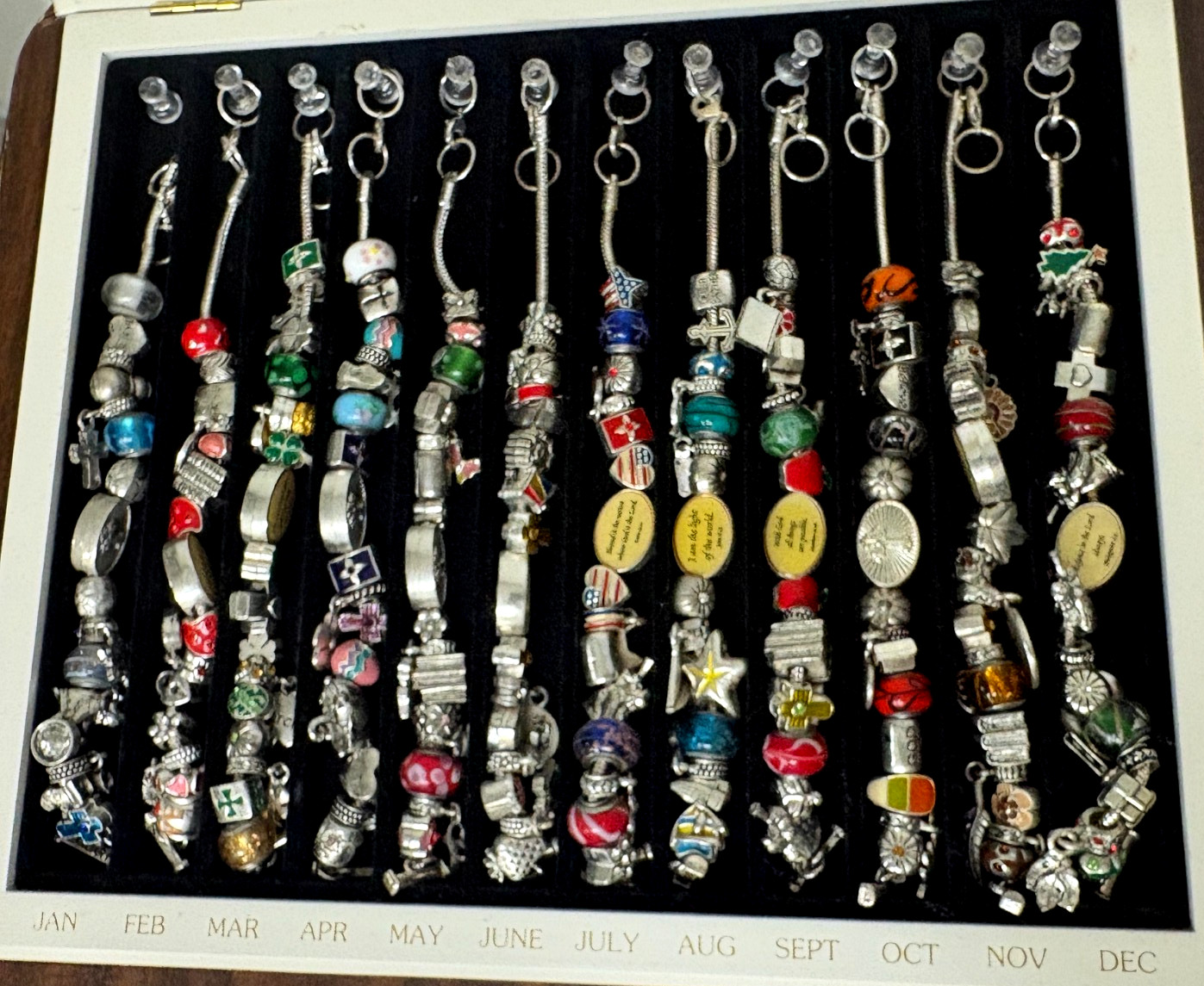 Pre Owned Willabee & Ward 12-Month Holiday Charm Bracelets Complete Wood Case