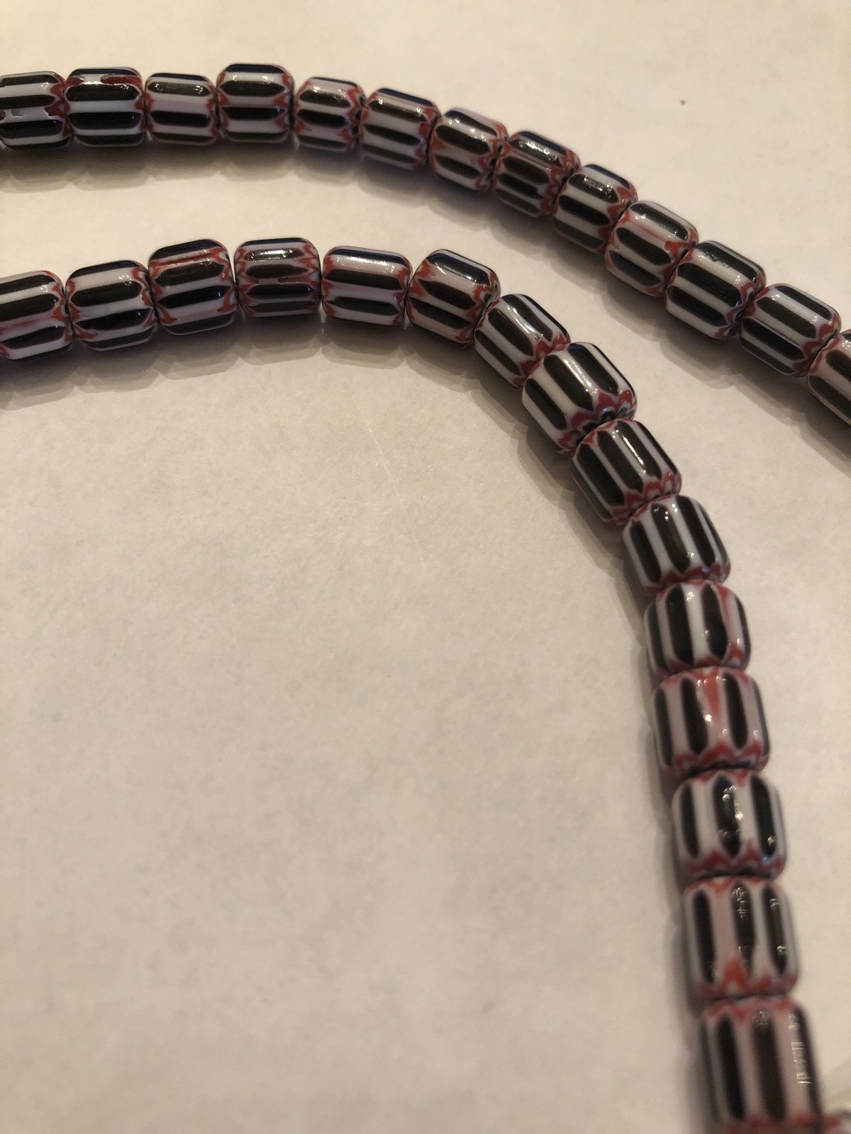 Vintage Red, White & Black Six Layer Glass Chevron Barrel Bead Strand