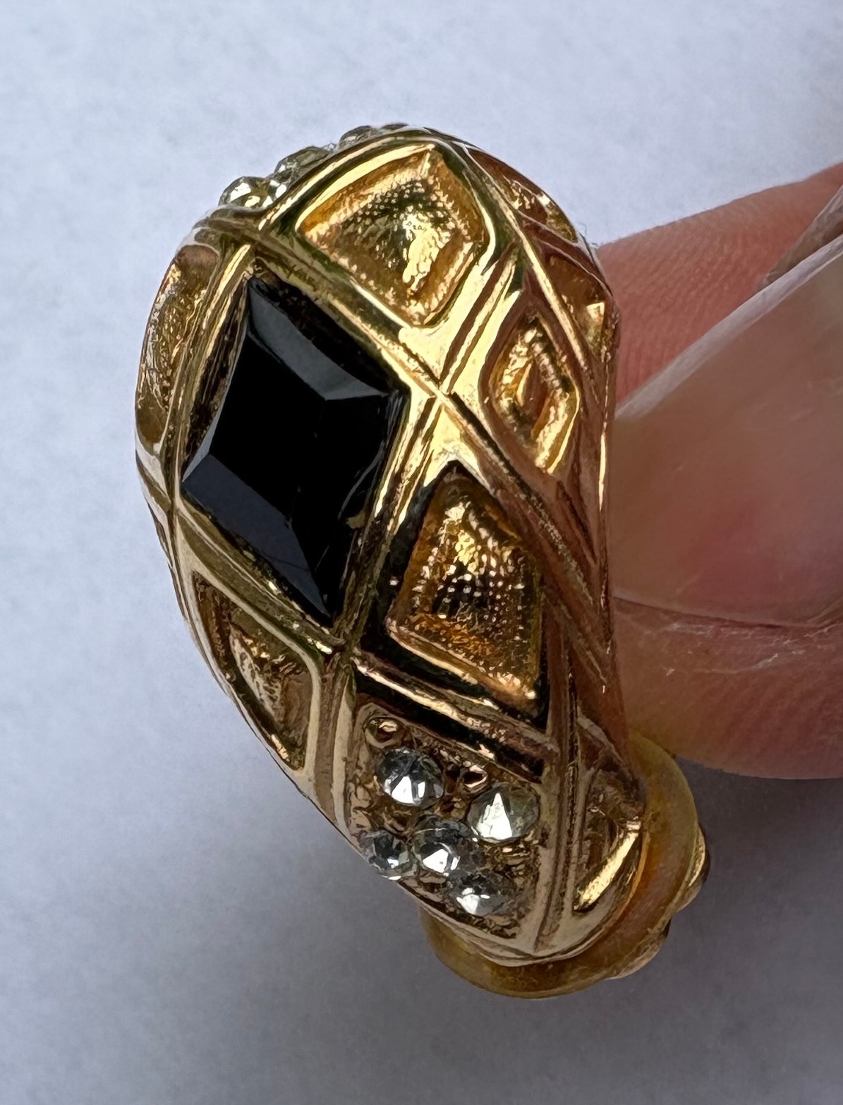 Clip-on earring with false diamonds