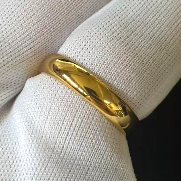 Simple Band Ring Gold-plated (NOT SURE) marked ‘ 999 ‘, Size 9 adjustable