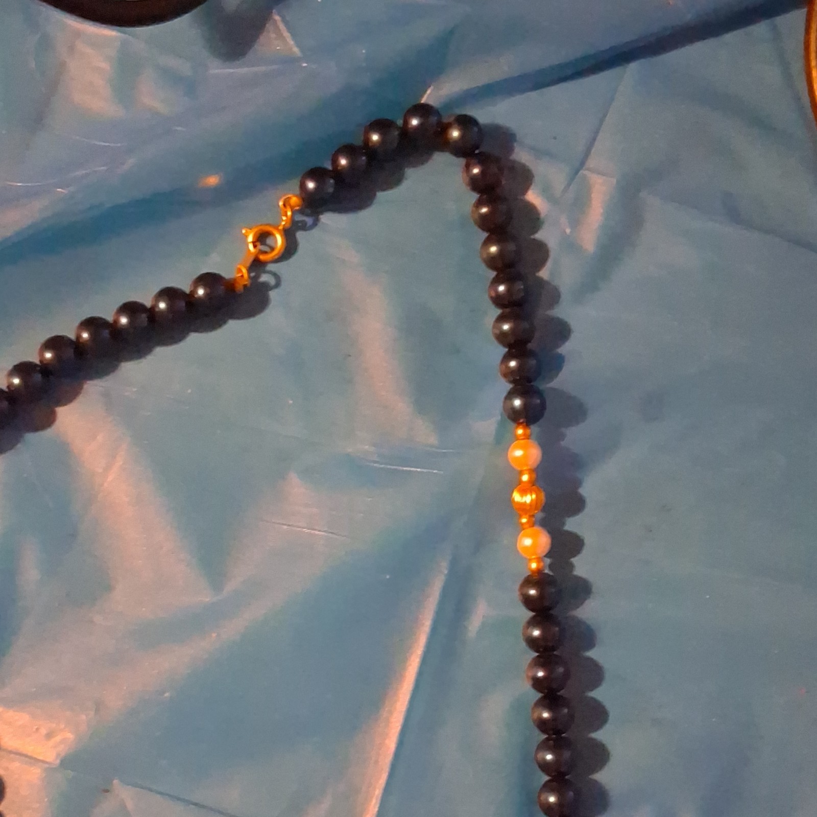Black Beaded Necklace with Gold Tone Bead Accents, Spring Ring Clasp