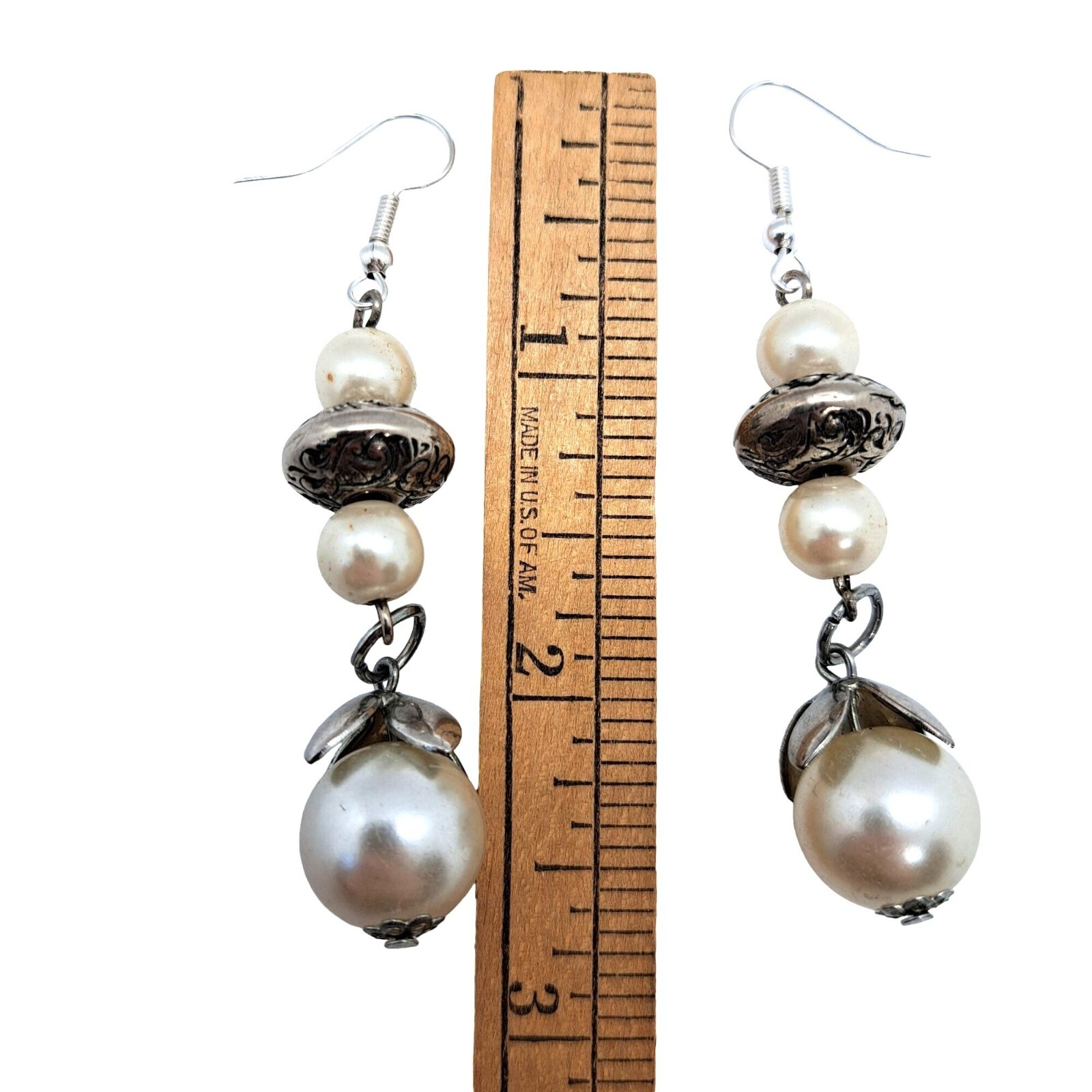 Faux pearls and silver tone pierced earrings earwires
