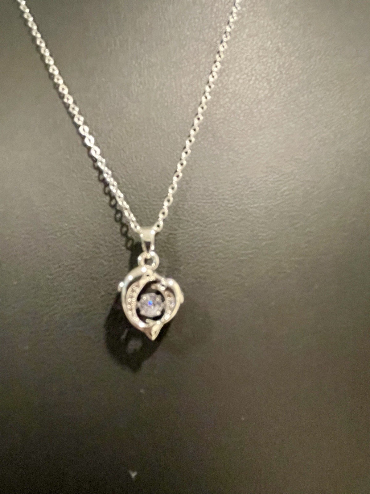 Dolphin Pendant Necklace with Clear Gemstones in Silver and Dancing Middle Gem