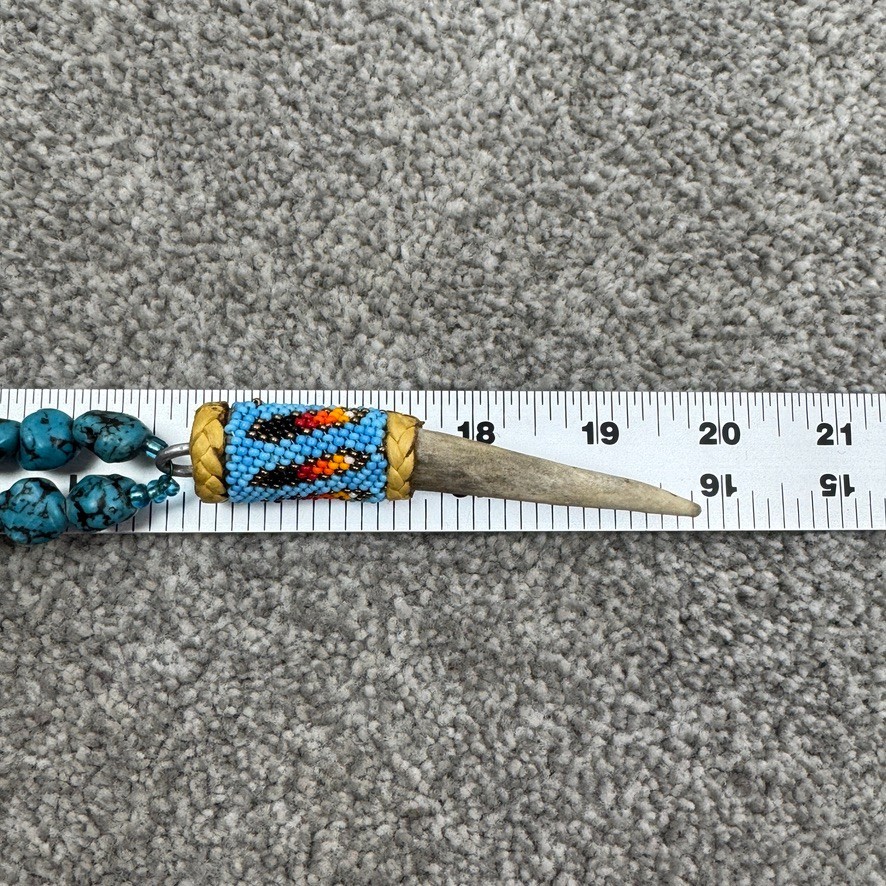 Handmade Necklace With Bone Pendant Wrapped In Beading On Blue Speckled Stones