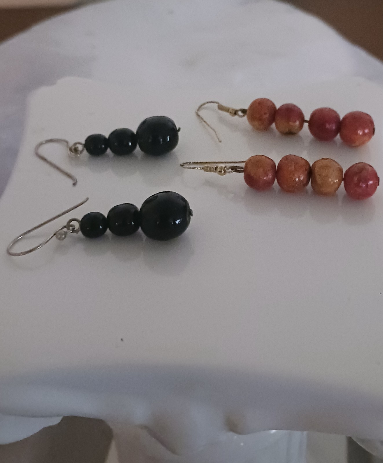 Beaded Dangle Earrings lot of 2 1 Black 1 Red Apple spunge