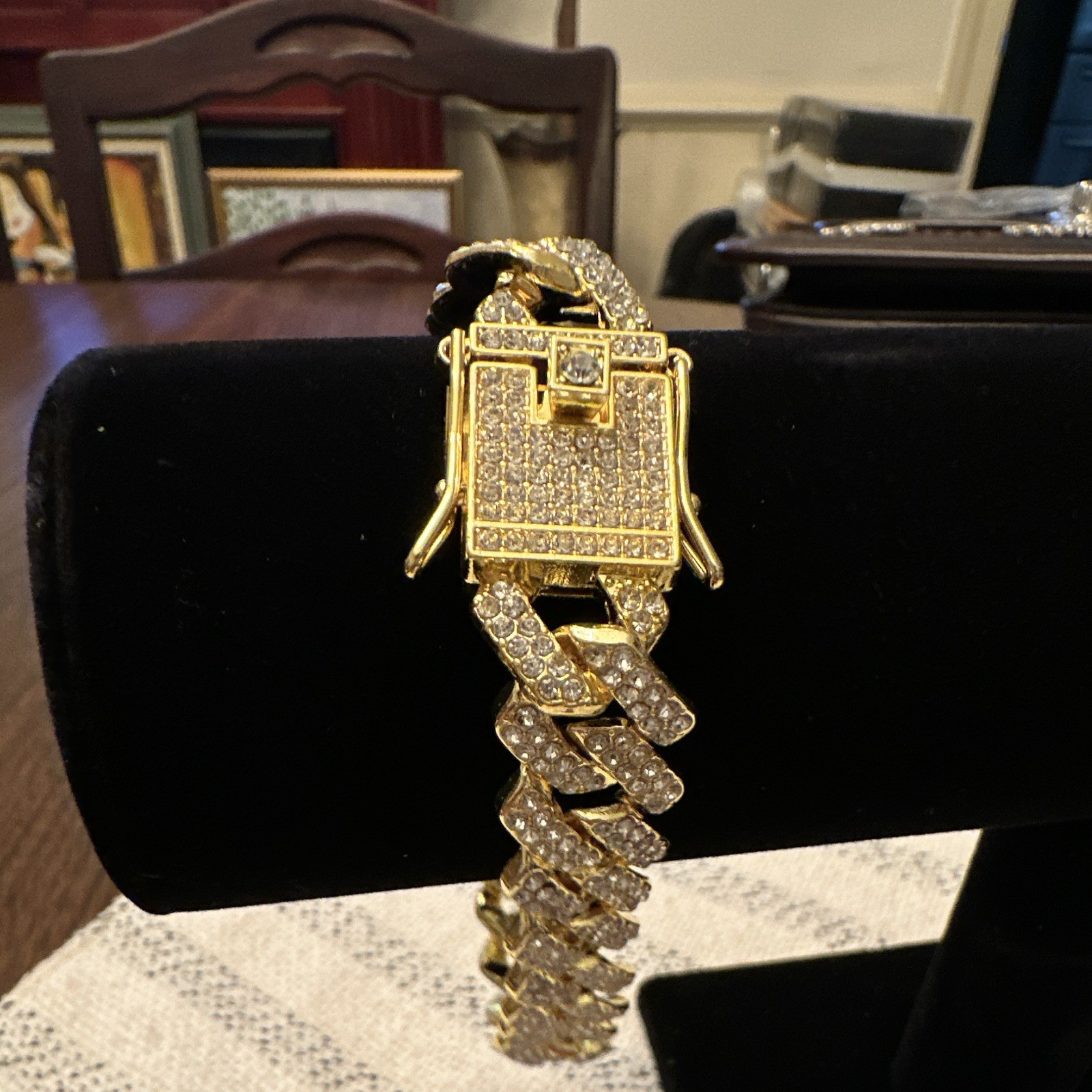Gold Tone Cuban Link Chain Bracelet with Pavé Setting and Box Clasp Closure