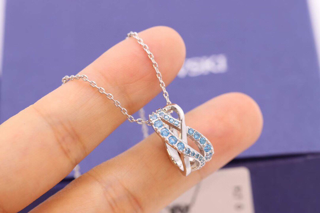 Swarovski Infinity Twist Silver Light Blue Crystal Pendant Necklace w/ Box