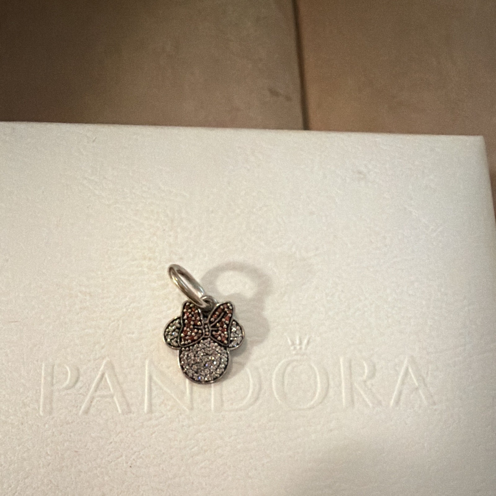 PANDORA Disney Minnie Mouse Dangle Charm, Silver with Clear Crystal Bow