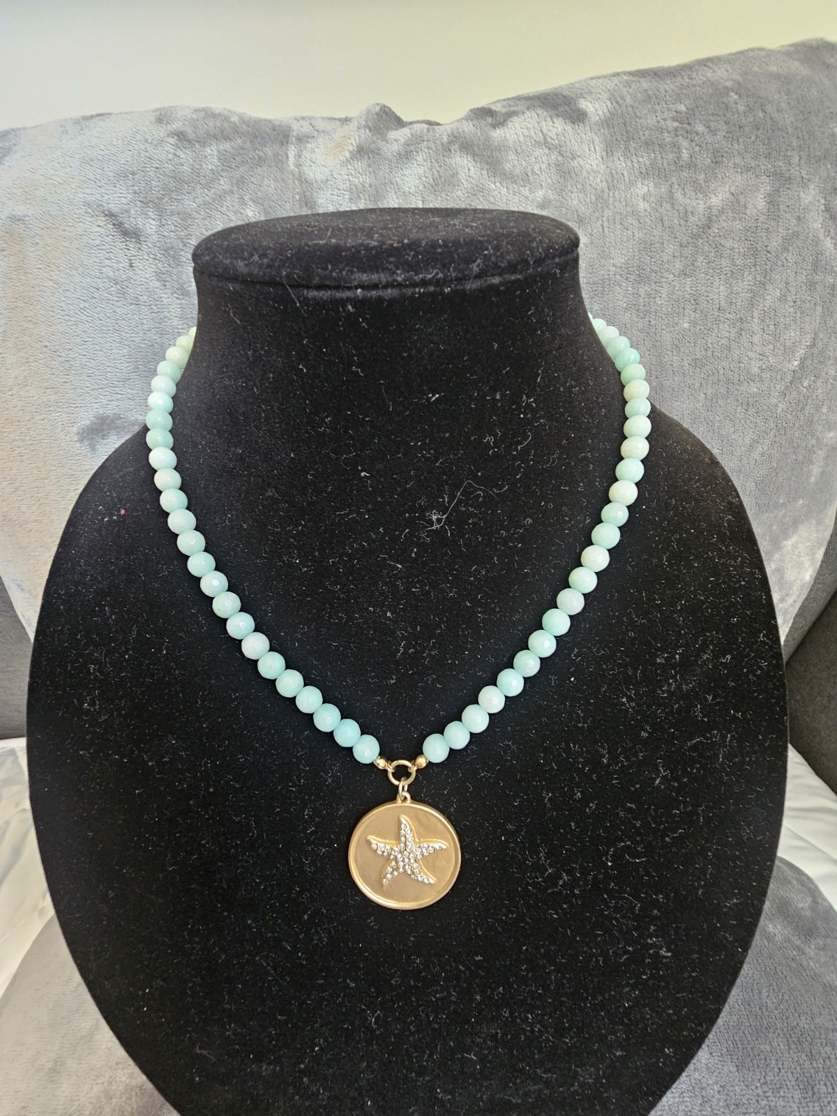 TOMMY BAHAMA AQUA BLUE NECKLACE WITH STAR FISH AND CLEAR STONES DISC.