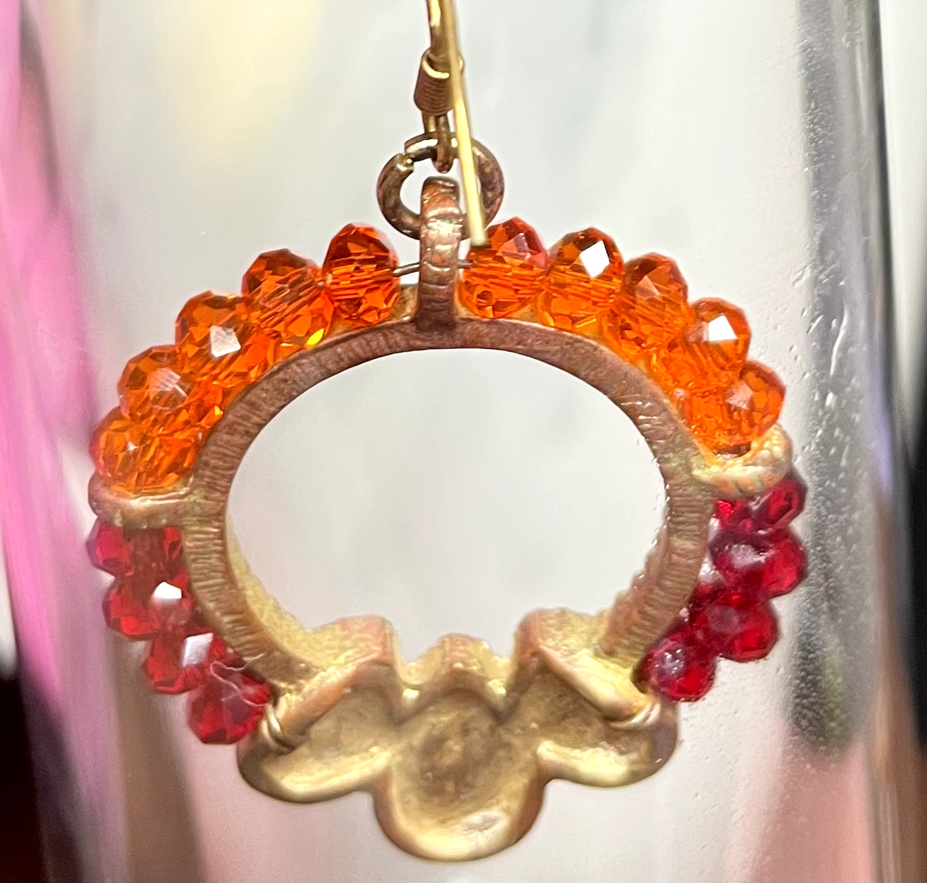 Ladies pre-owned 2.25 inches long dangle earrings orange red gold-tone
